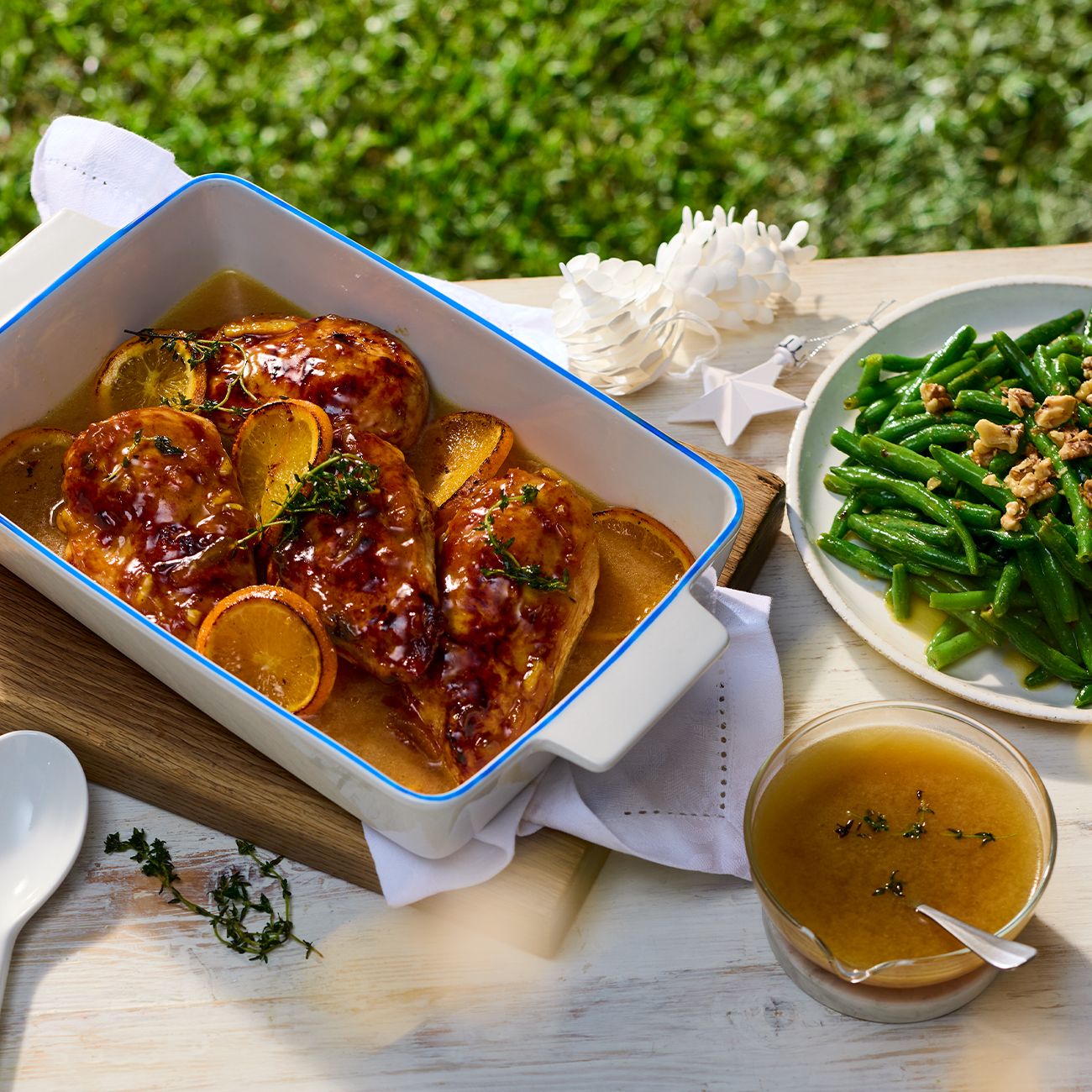 Sticky orange chicken with garlic butter green beans
